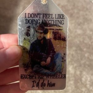 Handmade metal Rip Wheeler holiday ornament